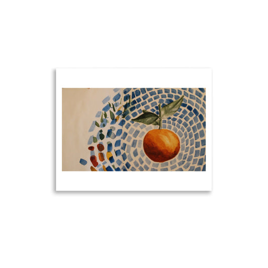 Product mockup of a watercolor print that depicts an artistic depiction of an orange with leaves on a mosaic-style background