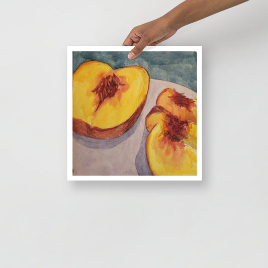 Product mockup of a watercolor print of a peach cut in half on a purple plate with a blue background
