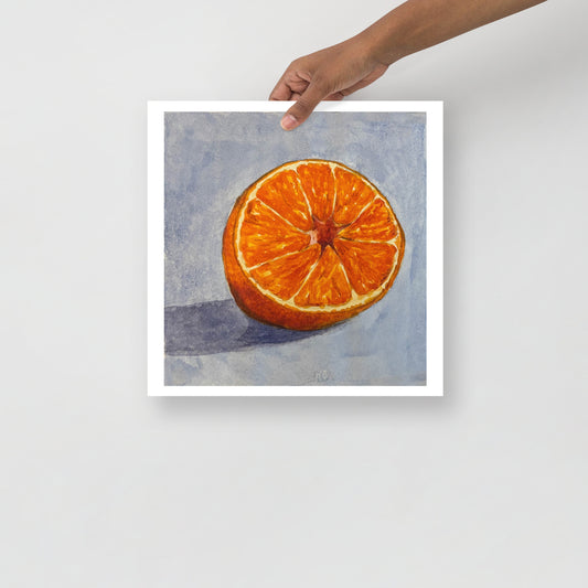 Product mockup of a watercolor painting print of Sliced orange on a textured blue background