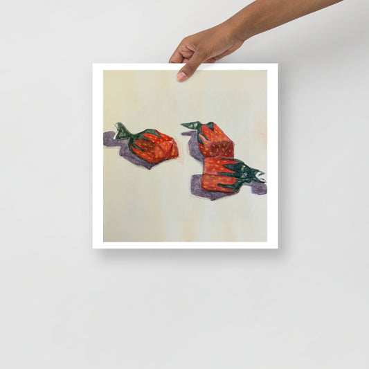Product mockup of a watercolor print that depicts three red strawberry candies on a white background