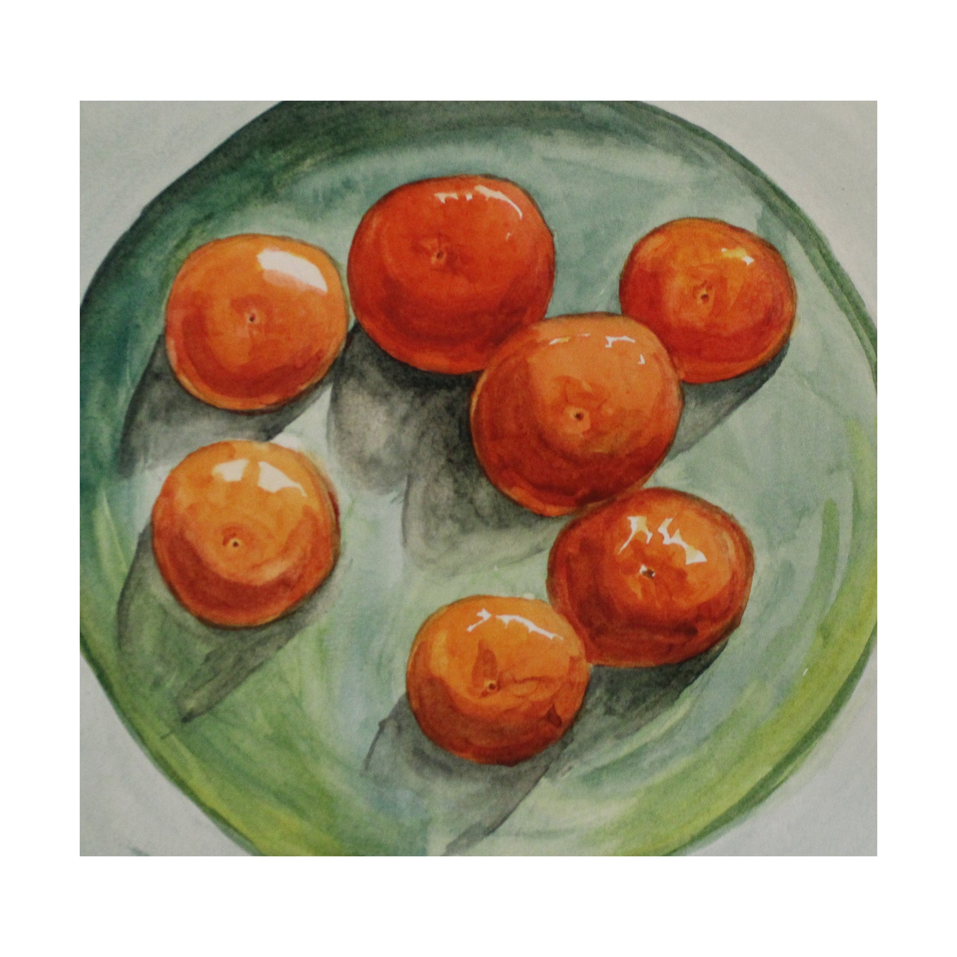 Artistic depiction of oranges on a green plate