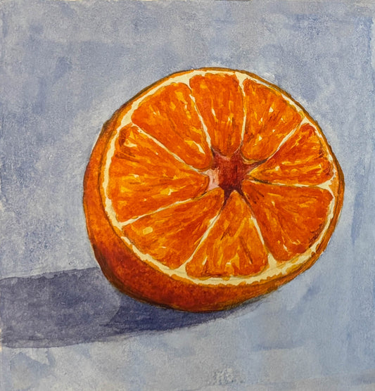 Sliced orange on a textured blue background