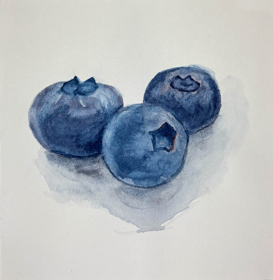 Watercolor painting of three blueberries on a white background
