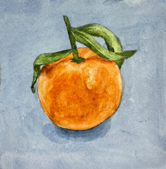 Watercolor painting of an orange with green leaves on a  blue background