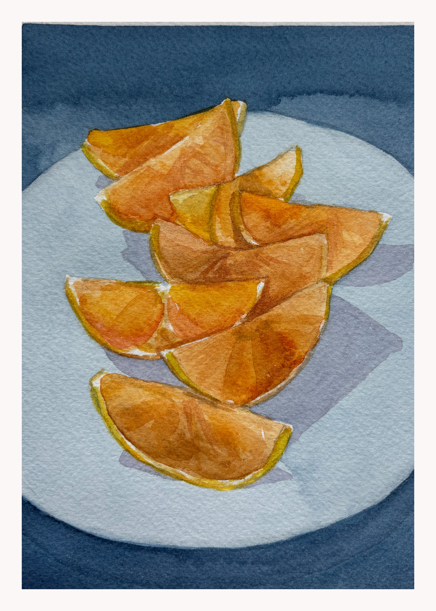Sliced Oranges on Blue