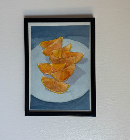 Sliced Oranges on Blue