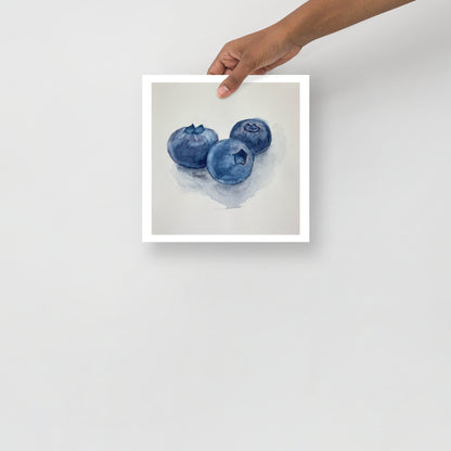 Product mockup of Watercolor painting of three blueberries on a white background