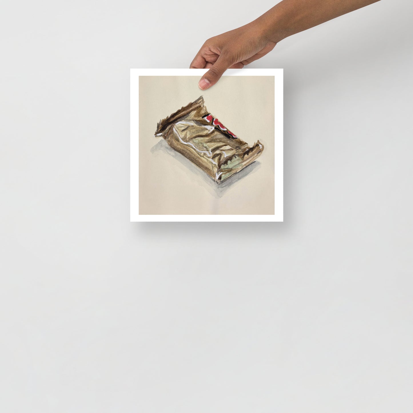product mockup of Artistic depiction of a crumpled chocolate bar wrapper on a beige background