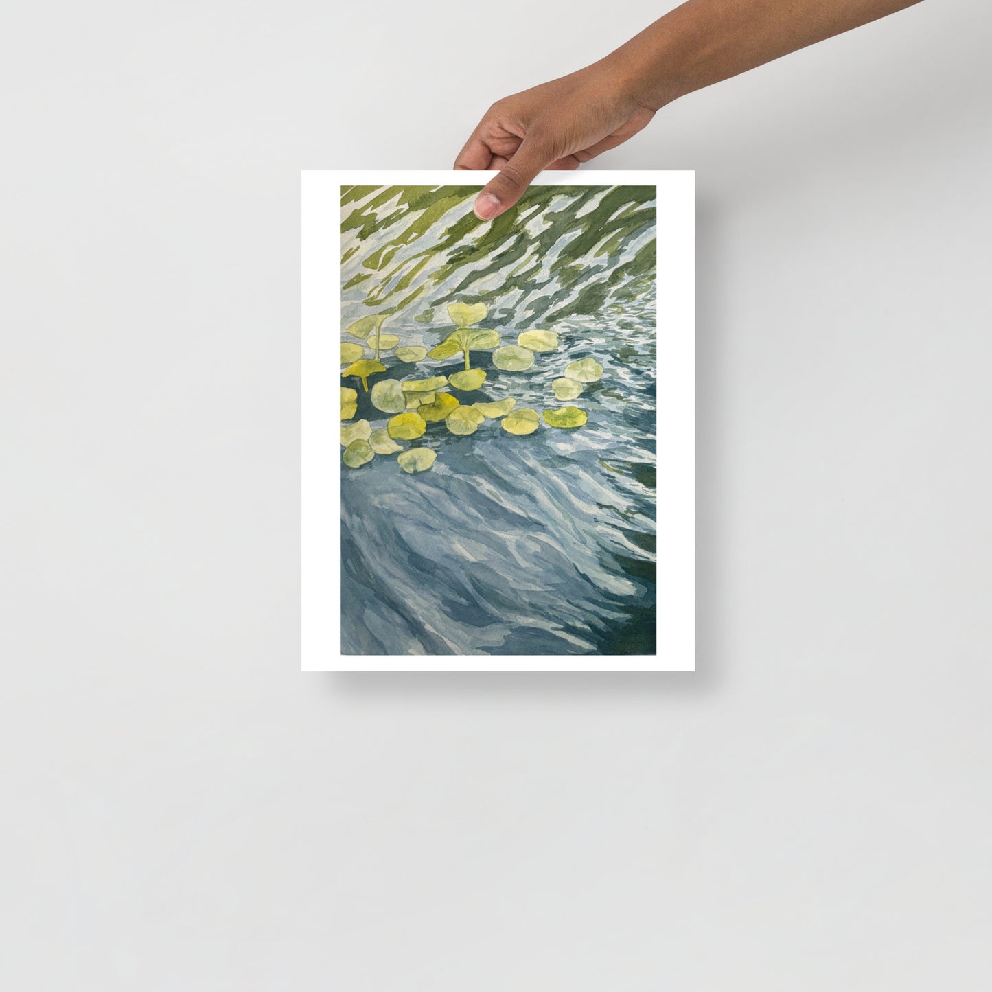 Product mockup of Artistic depiction of water lilies floating on water with a textured background