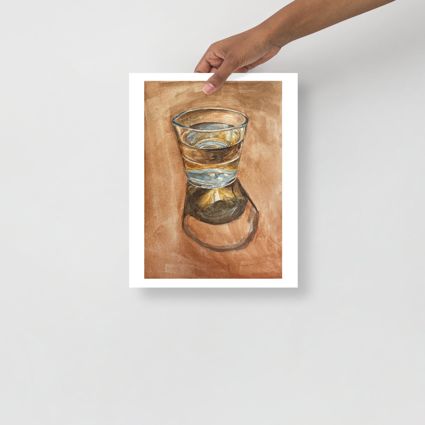 Product mockup of Artistic depiction of a glass with water on a brown background