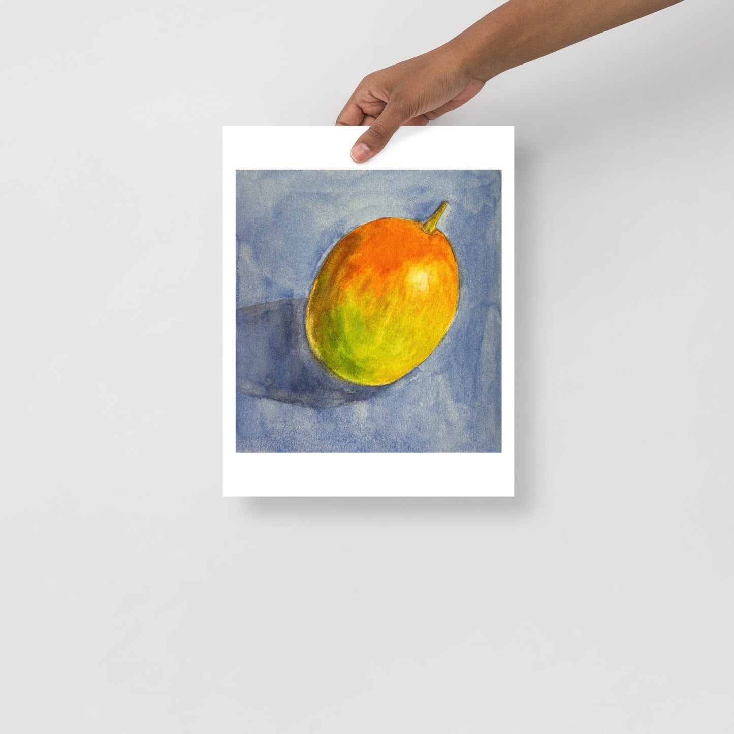 Product mockup of Colorful mango illustration on a blue watercolor background