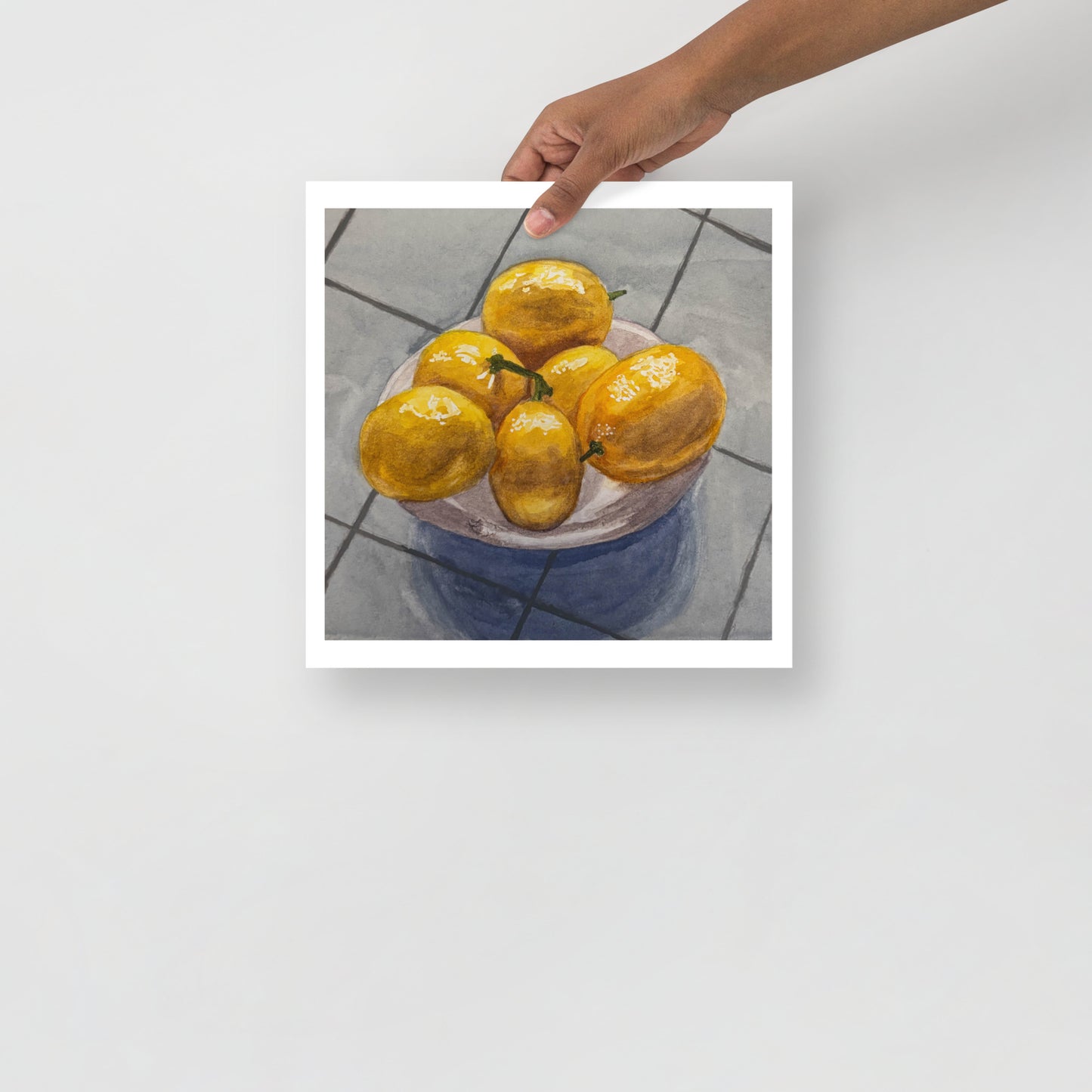 Product mockup of Still life painting of lemons on a plate with a textured gray background
