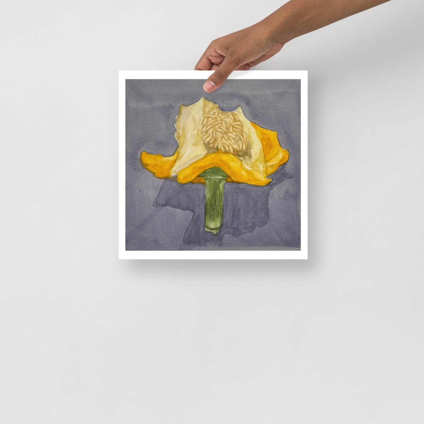 Product mockup of Artistic depiction of a yellow bell pepper with a green stem on a gray background