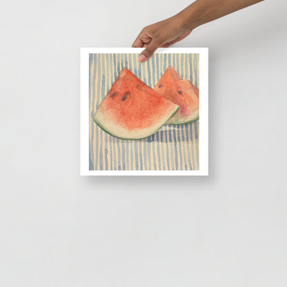 Product mockup of Two watermelon slices on a striped fabric background
