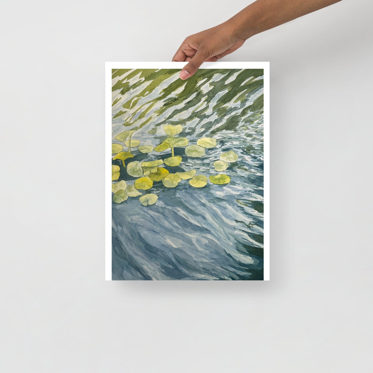 Product mockup of Artistic depiction of water lilies floating on water with a textured background