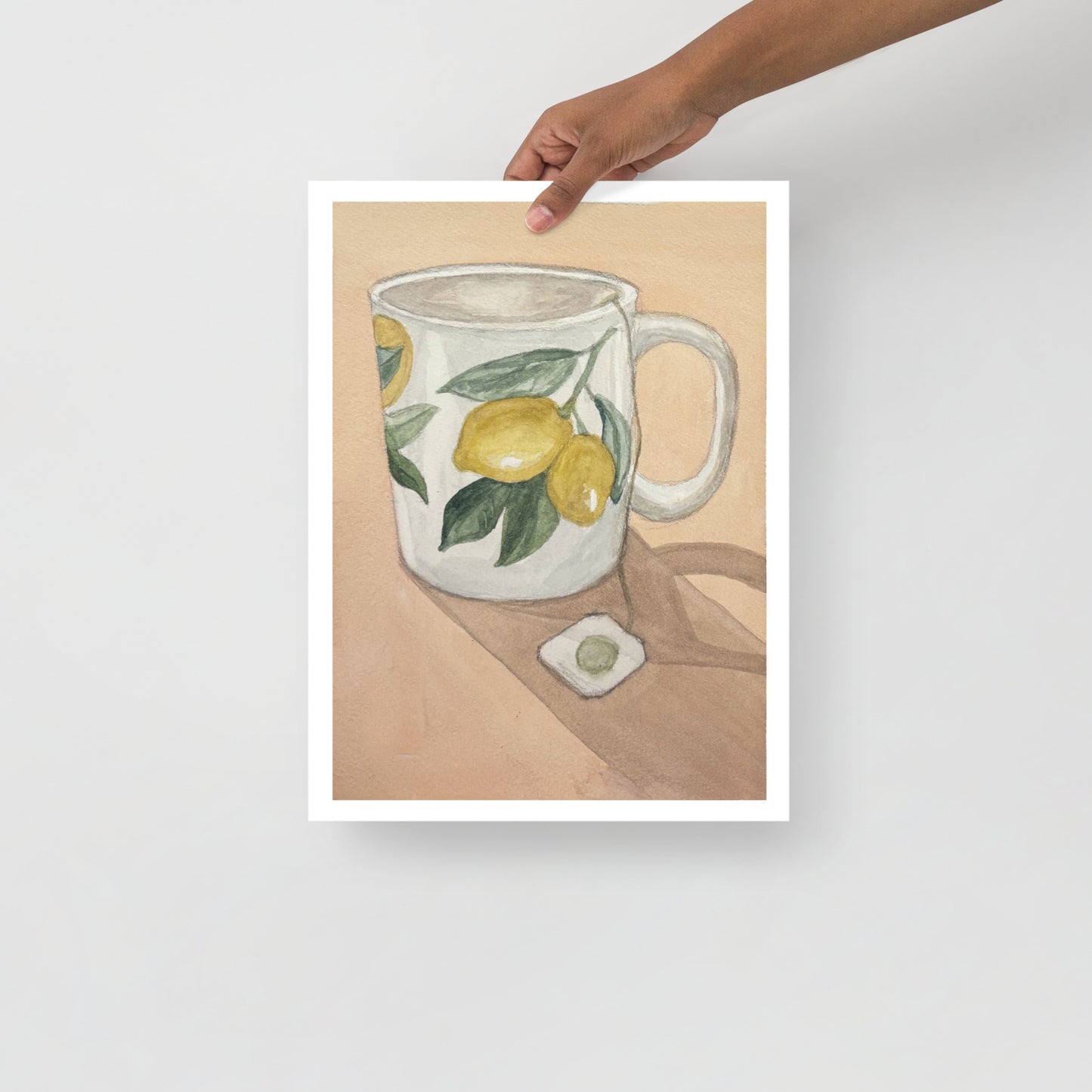Product mockup of Ceramic mug with lemon design on a beige background