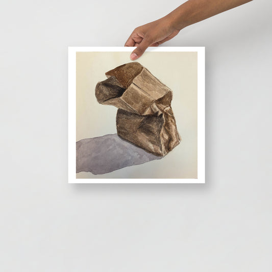 Product mockup of a watercolor print that depicts a brown paper bag on a light beige background