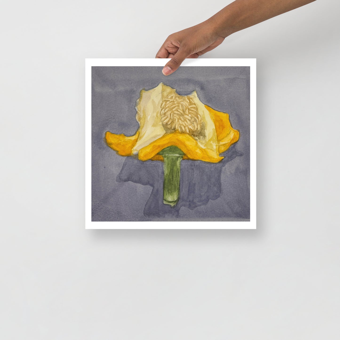 Product mockup of Artistic depiction of a yellow bell pepper with a green stem on a gray background