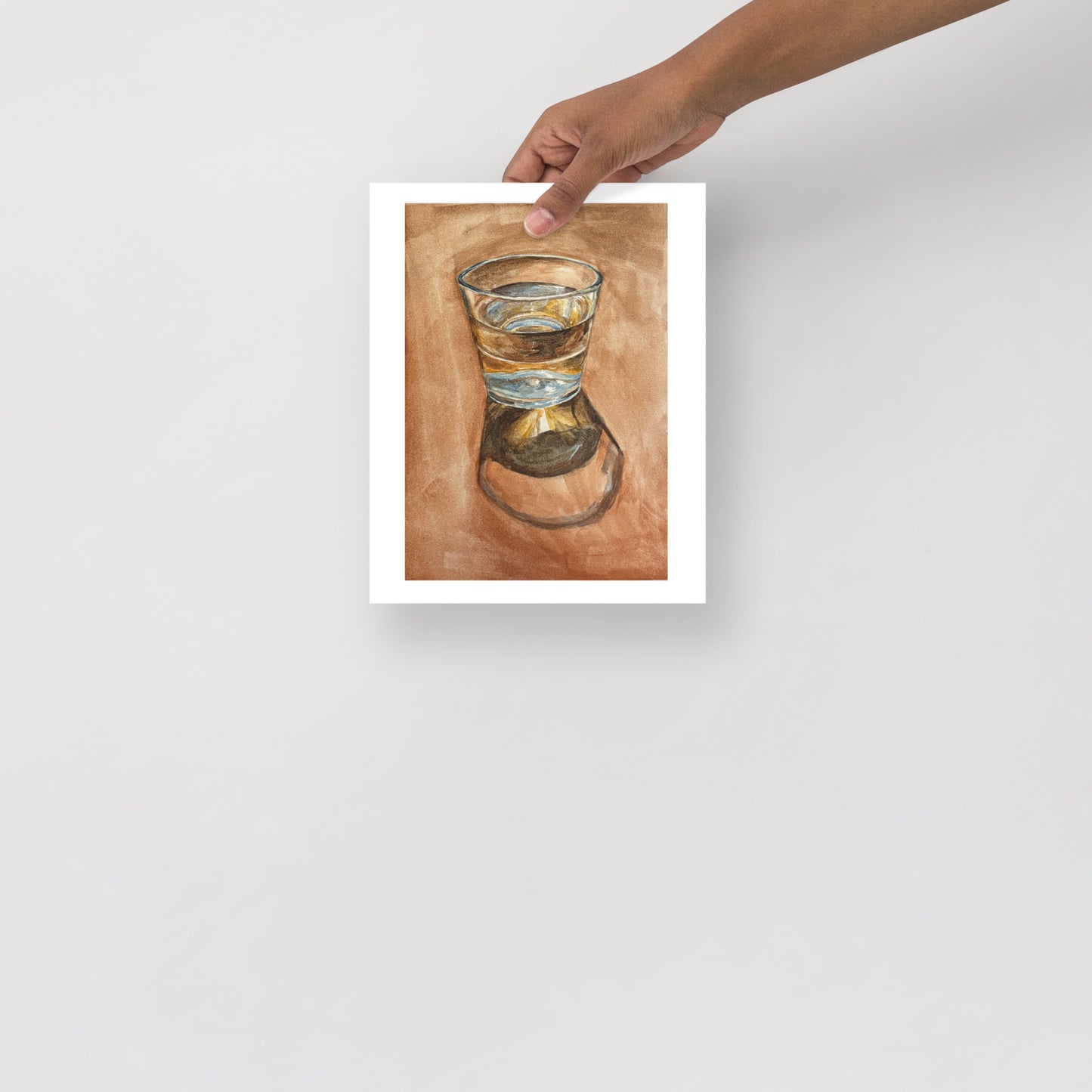 Product mockup of Artistic depiction of a glass with water on a brown background